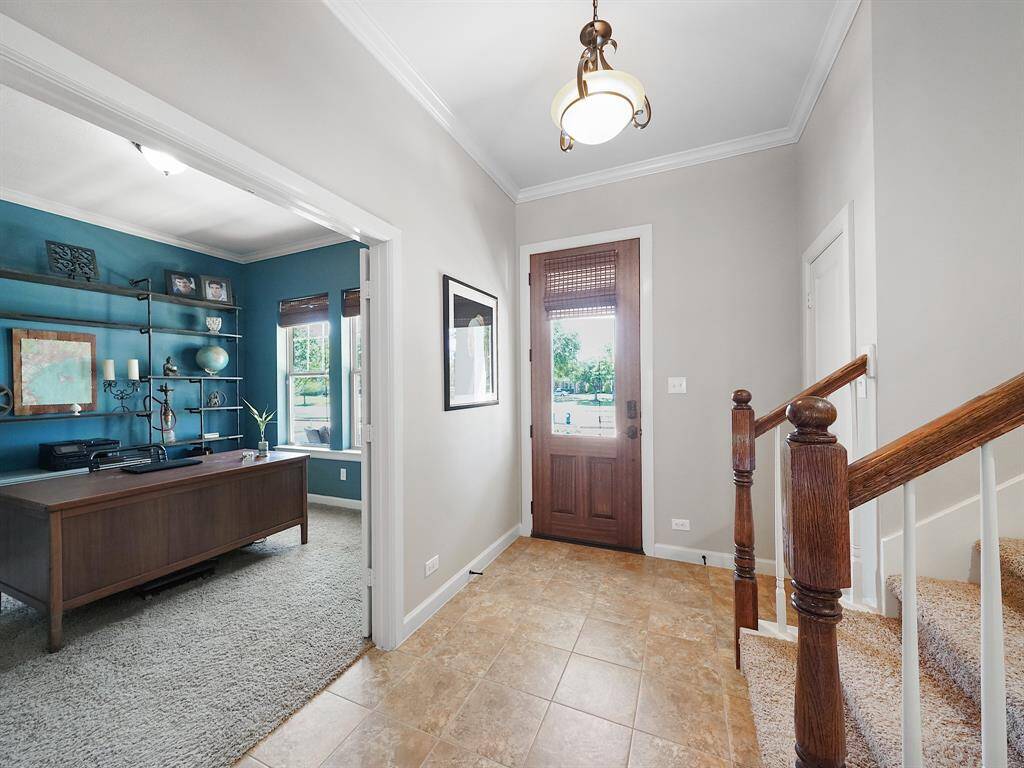 The elegant tile flooring and soothing color palette further enhance the ambiance, setting the stage for the sophisticated lifestyle that awaits.