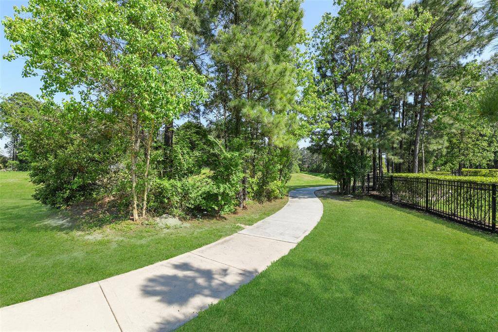 Step out of your backyard onto miles of walking trails through nature!