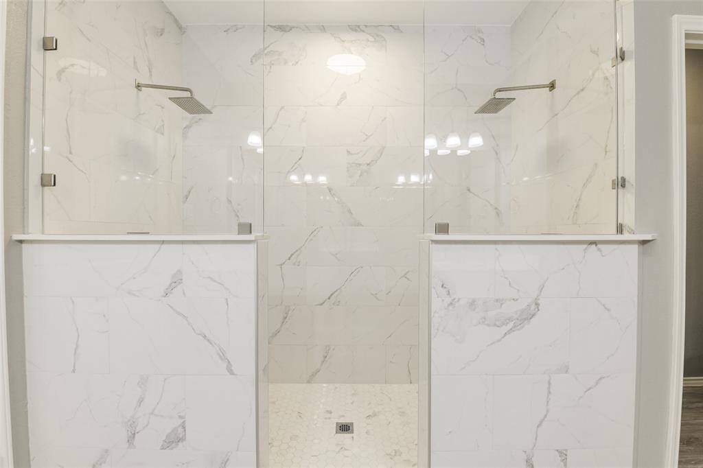 Updated dual Walk-in Shower in Primary Bathroom