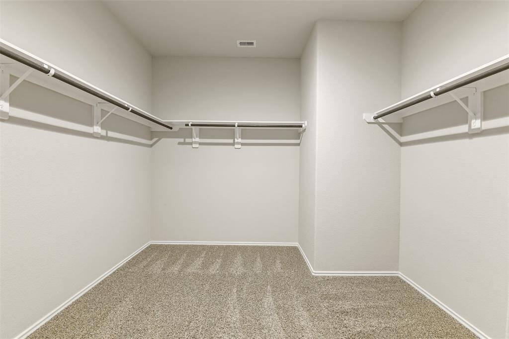 Huge Walk-in Primary Closet