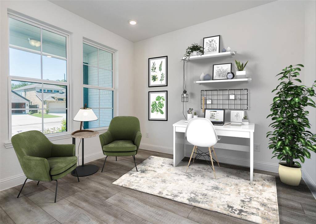 Representative photo of the downstairs study/office with furniture. (Virtually staged by McCurdy Media)