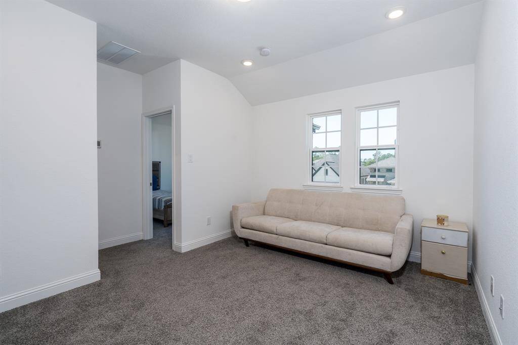 Upstairs you'll find 3 bedrooms, a full bath and this adorable game room.