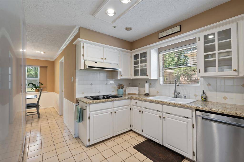 The dining room leads into the kitchen.