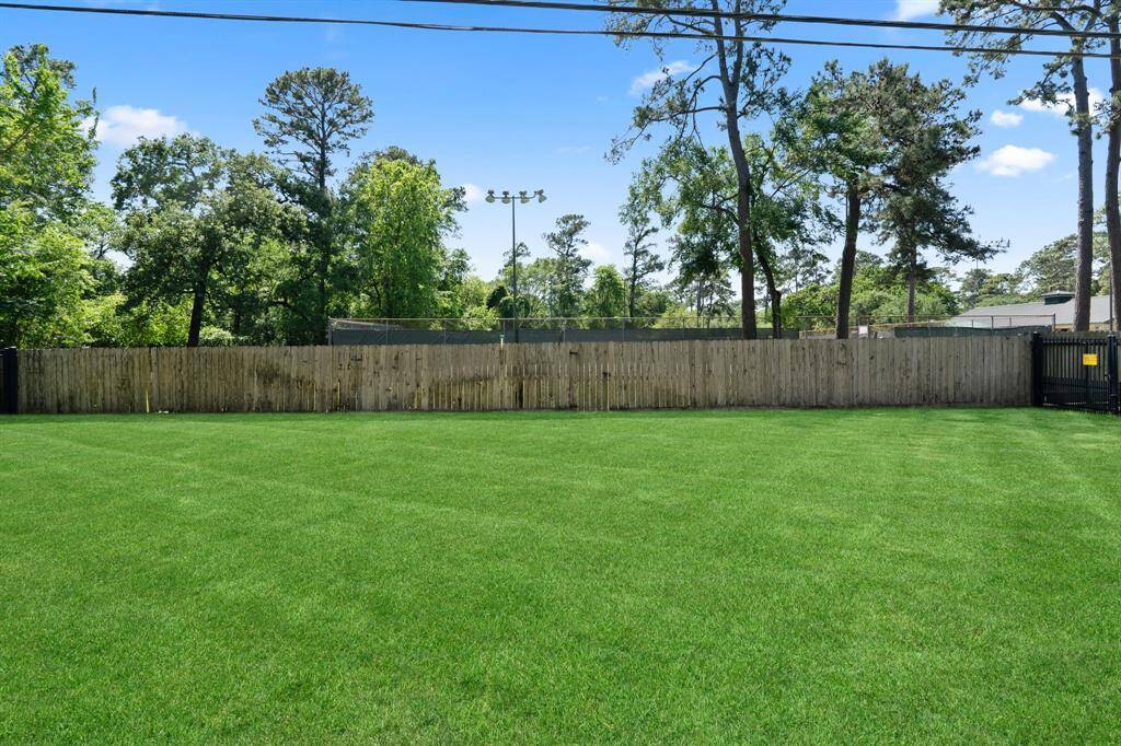 Look at this over-sized space! There's a gate leading to the space beyond.