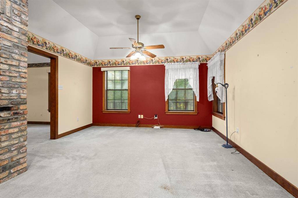 Lounge area connecting to kitchen and living area