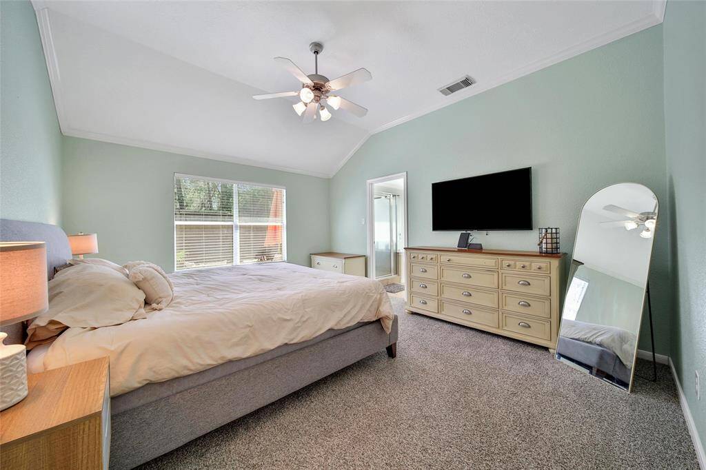 The primary bedroom is at the back of the home and overlooks the back yard.