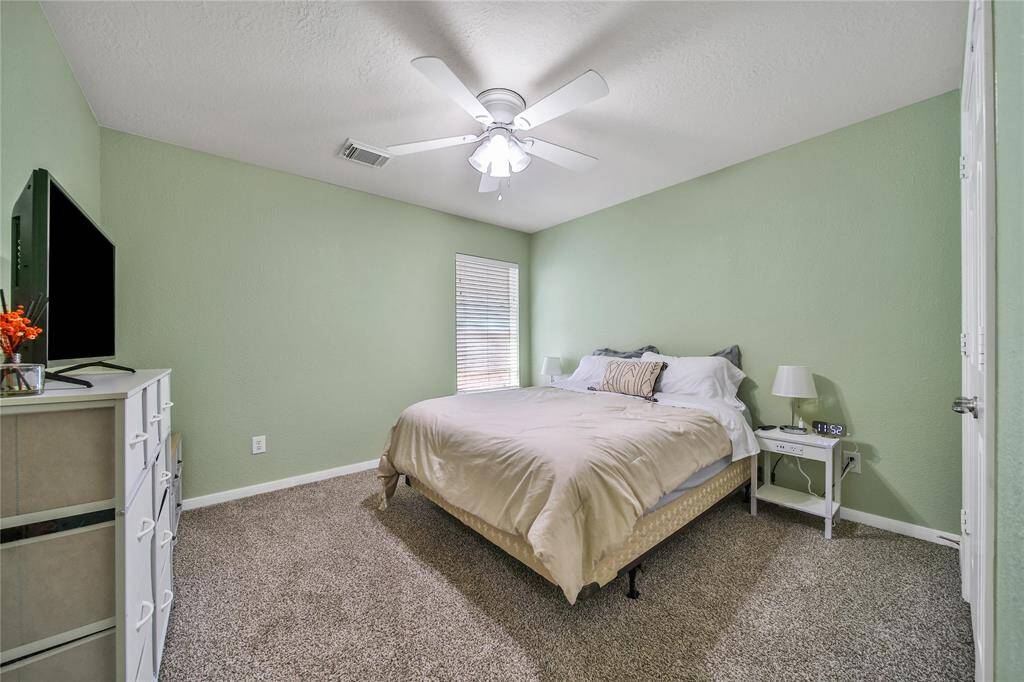 The secondary bedrooms are nicely sized and separated from the primary bedroom.