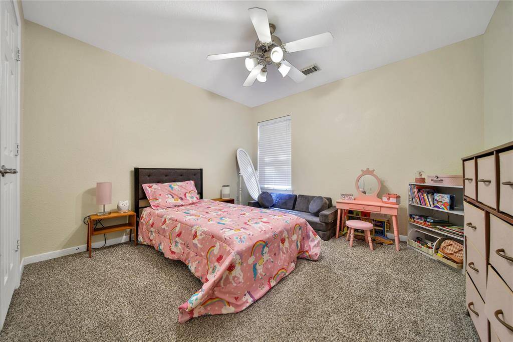 The secondary bedrooms are nicely sized and separated from the primary bedroom.
