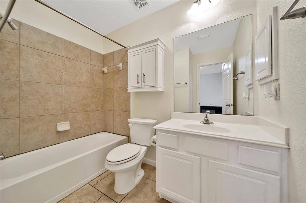 The secondary bathroom is off of the flex space in great proximity to the secondary bedrooms.