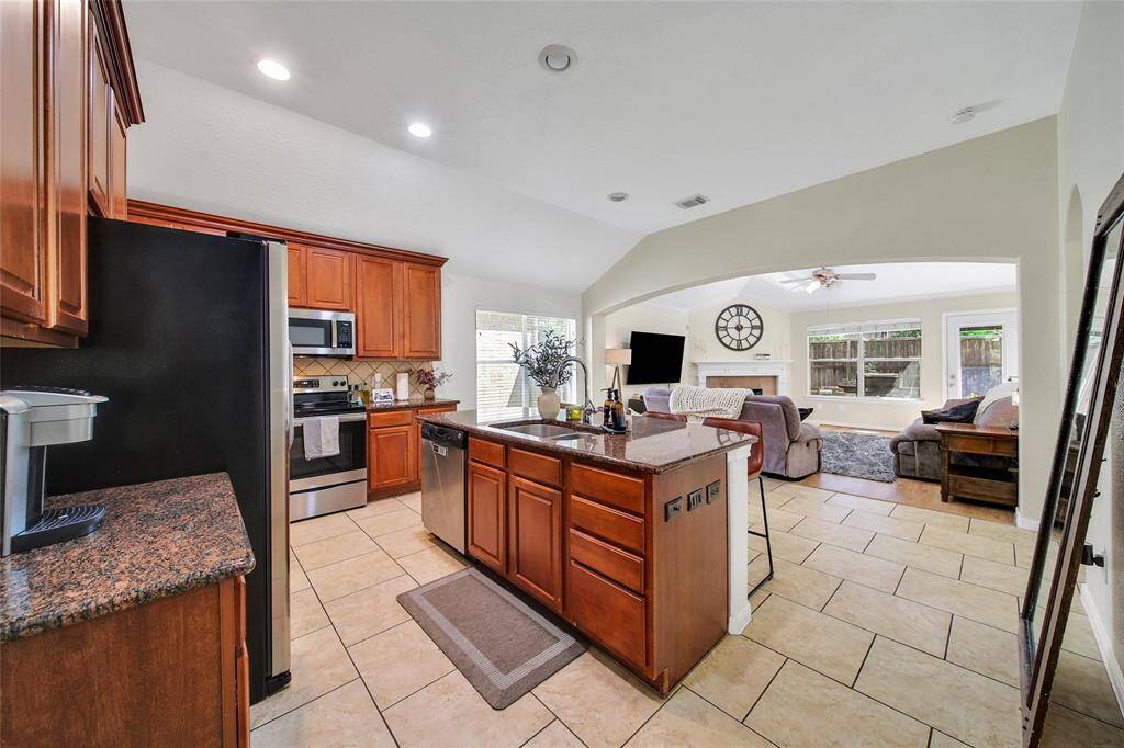 This section of the home is an open concept and is a great space for your every day living.
