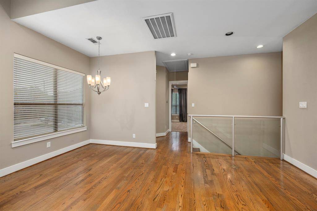 The room is further enhanced by recessed lighting.