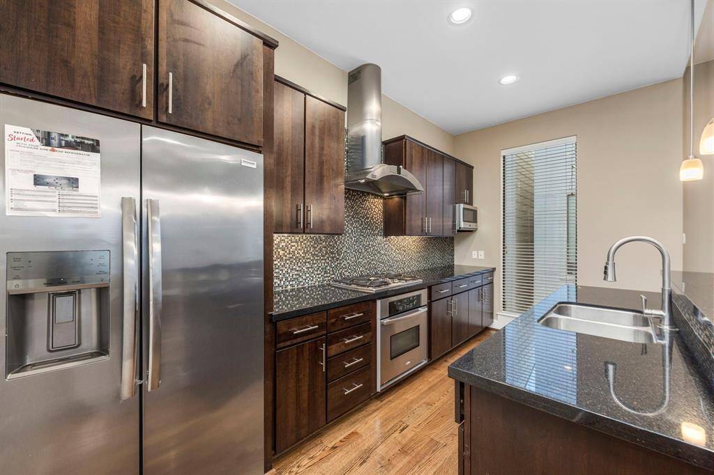 Kitchen area, refrigerator included.