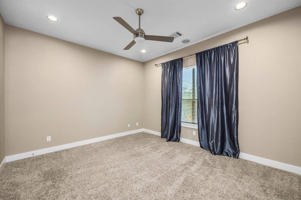 Large windows grace the room allowing natural light in!