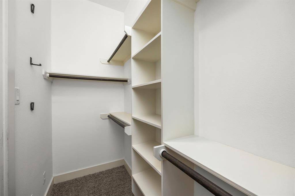 Primary closet with plenty of storage space.