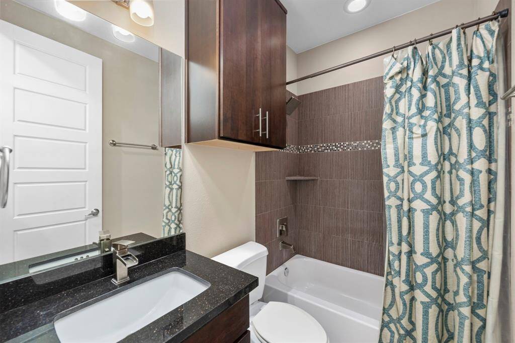 Full bathroom located on the 1st floor with a tub and shower combo.