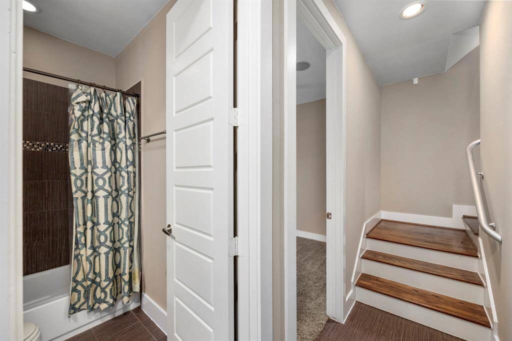 Full bathroom located on the 1st floor with a tub and shower combo.