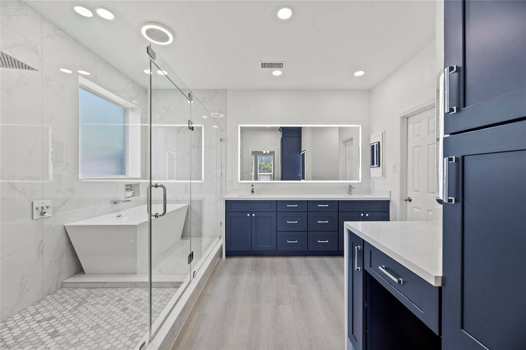 Check out this incredible, fully remodeled primary bath!