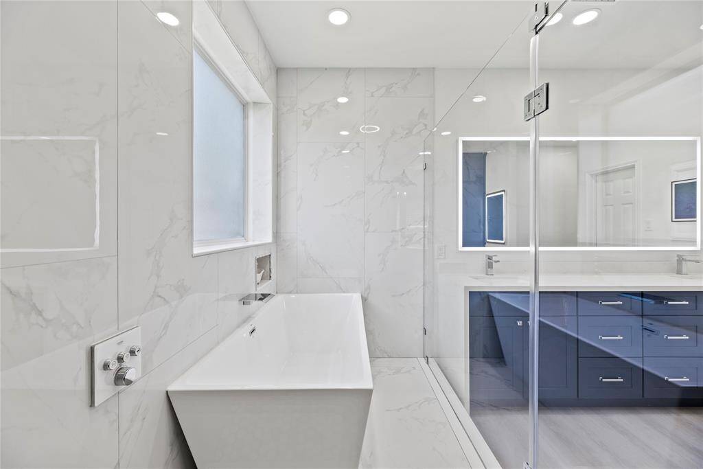 There's even a Bluetooth speaker in the fan above the shower!