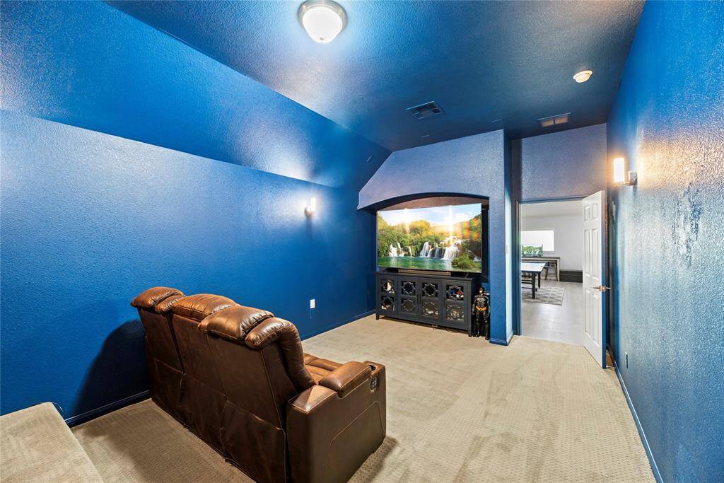 This media room even has home theater risers so everyone has a great view of the screen!