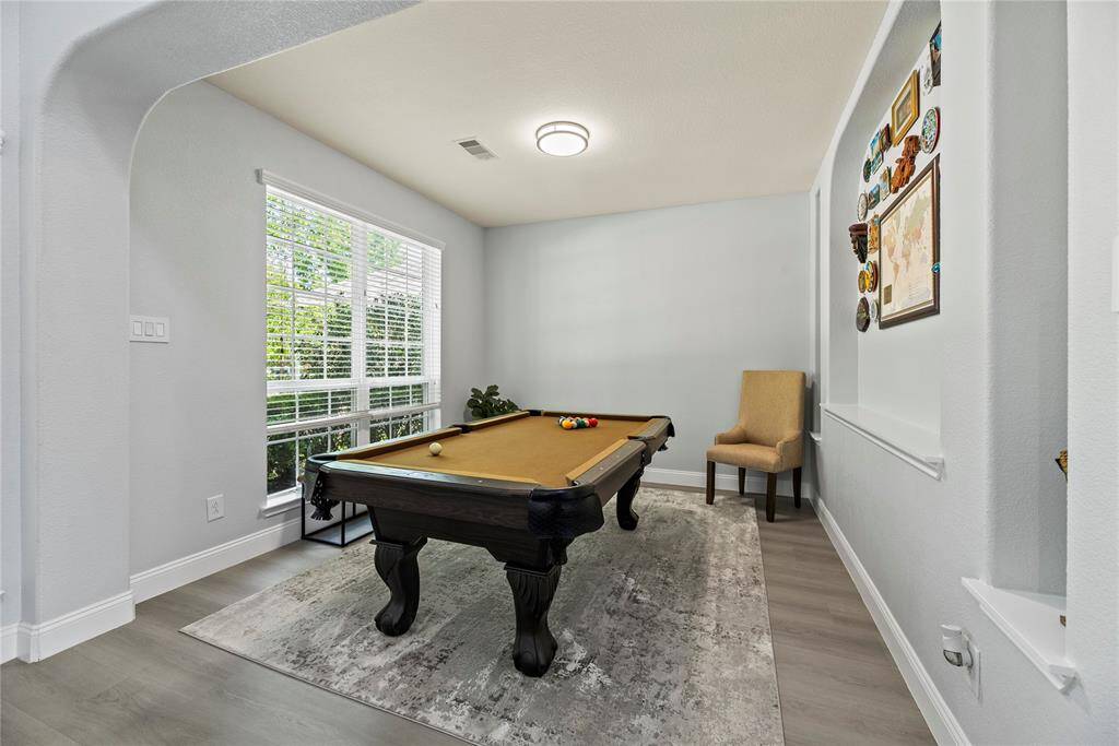 Formal dining or formal living room to the left as you enter the home.