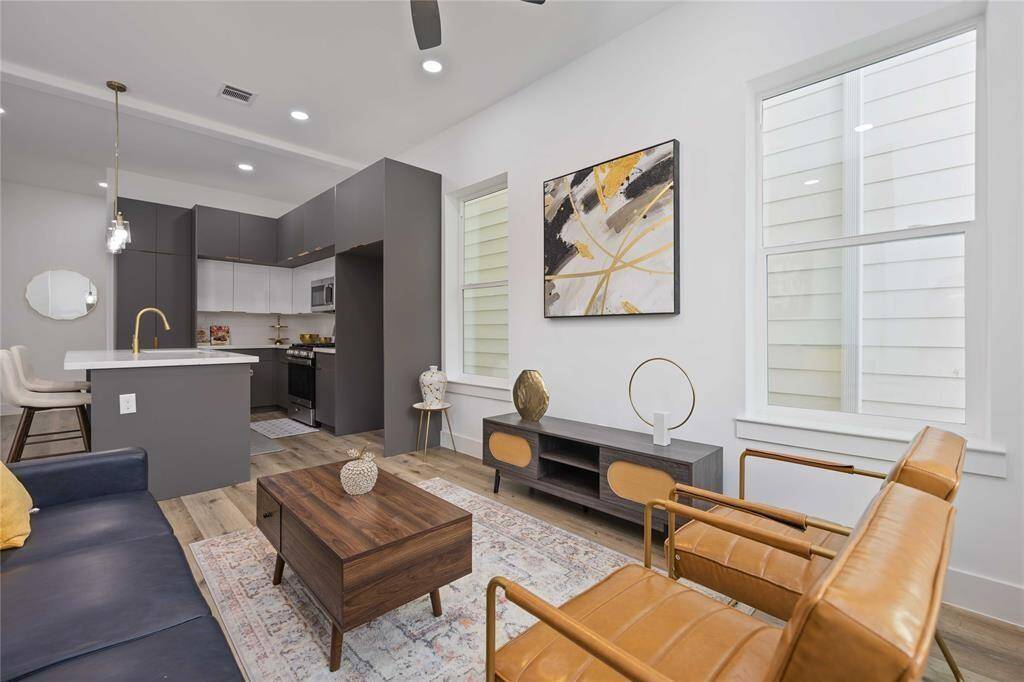 This open floor plan (living, dining, and kitchen) on the first floor allows for ease of living and entertaining.