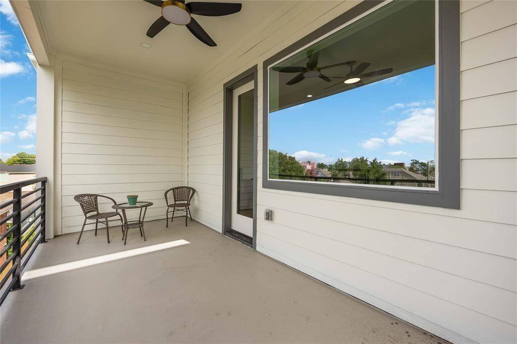 The oversized balcony with a ceiling fan is right off the gameroom.