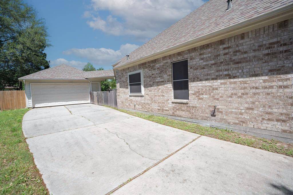 Detached garage with extended driveway