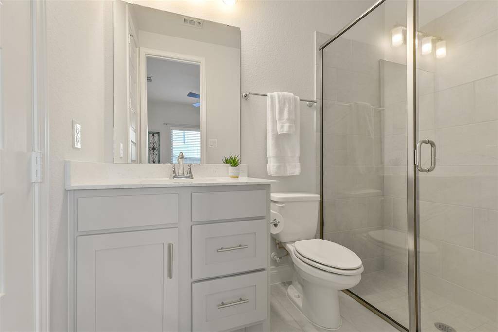 Downstairs ensuite bath has mudset shower.