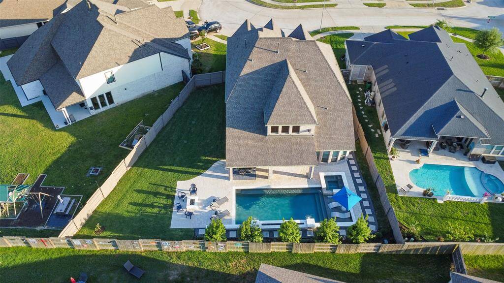 This yard is large enough for multiple outdoor activities.