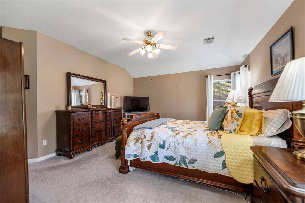 Another view of the primary bedroom
