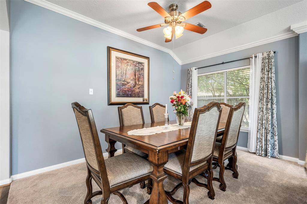 Formal dining room  located just off of the kitchen.