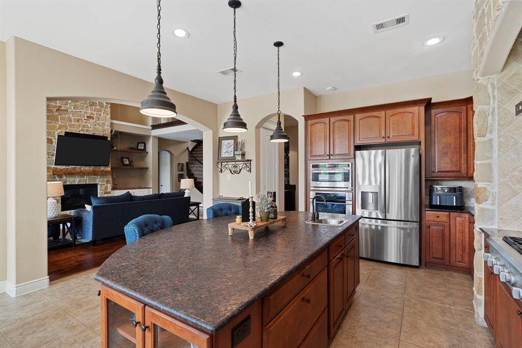 Open-concept kitchen and living room layout, perfect for entertaining and everyday family living.