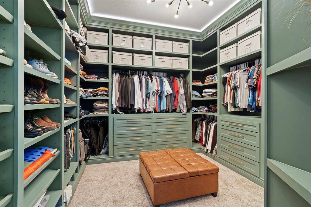 Dream closet with built-in drawers, ample shelving, and organized hanging space—designed to keep everything in perfect order.