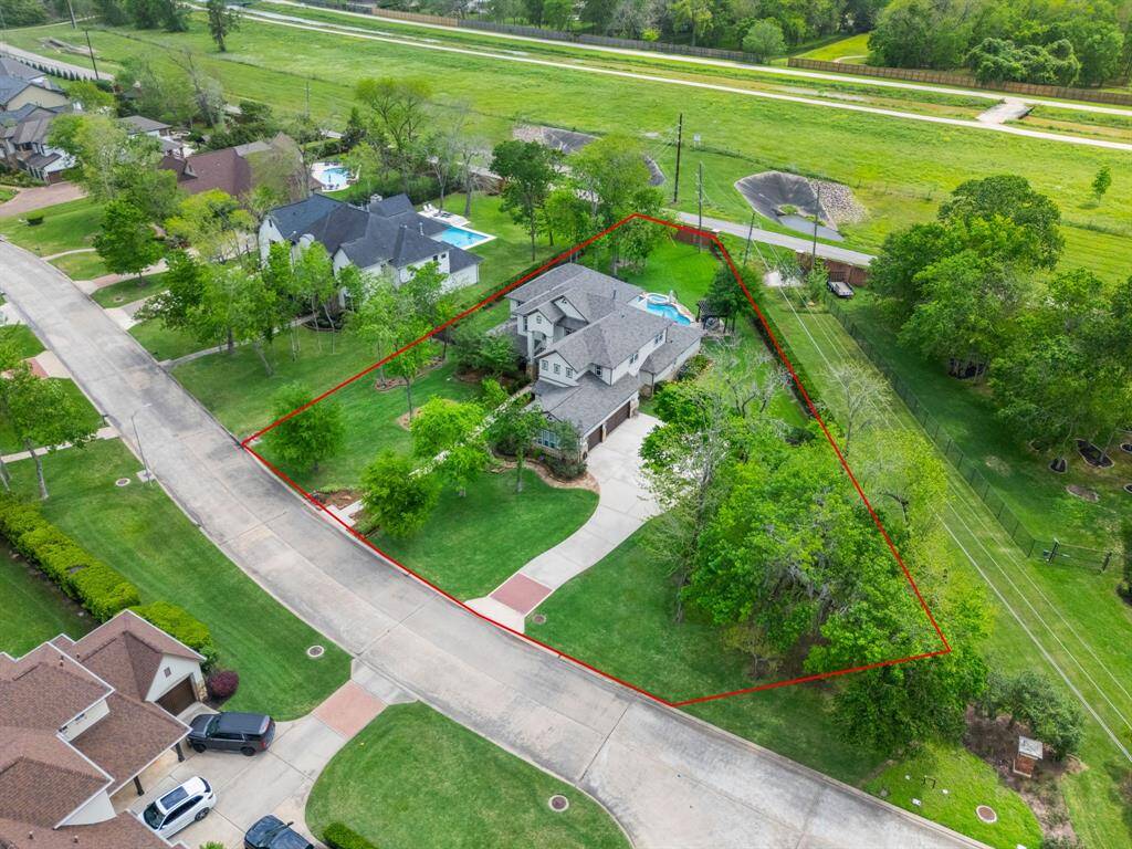 Nestled on a sprawling .79-acre lot boasting 6 beds, 4 full baths and 2 half baths.