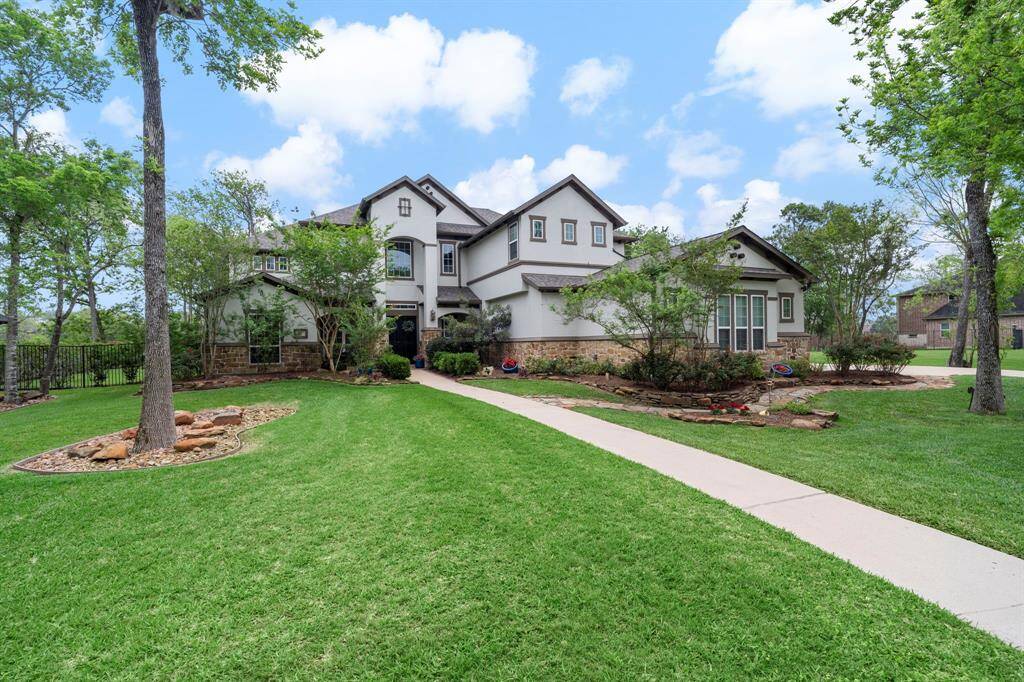 Beautiful landscaping and mature trees abound!