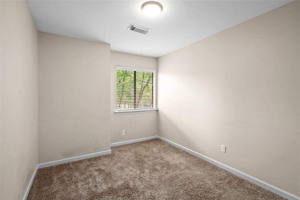 Another view of your cozy bedroom with a window for lots of natural light.