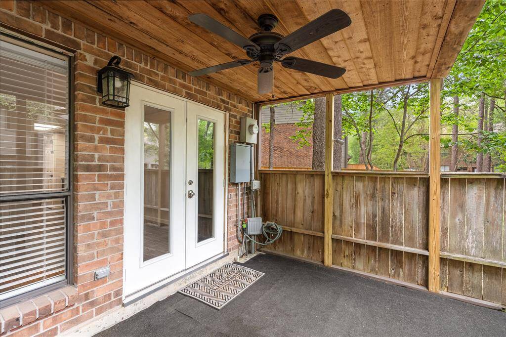 The set of French doors opens onto your patio. The window provides natural indoor daylight while the coach light brightens your patio at night.