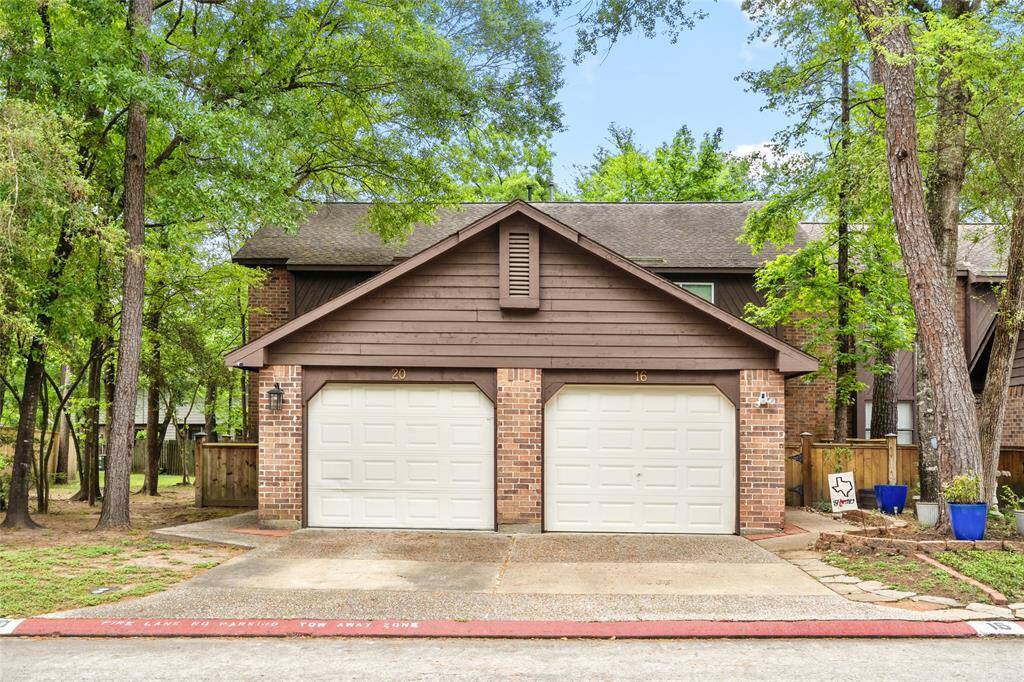 Your new townhouse has a brick and wood exterior. Nestled among mature trees providing a serene, natural setting in a cozy, wooded neighborhood in the highly sought after area of The Woodlands.