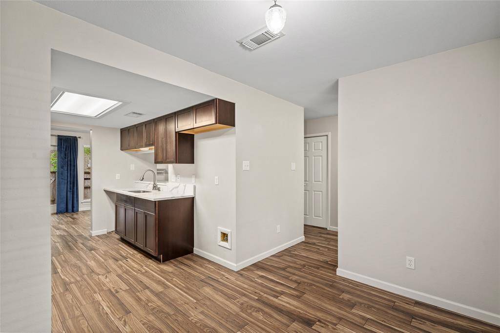 A view of your kitchen from the dining room highlights the open layout of your new home.