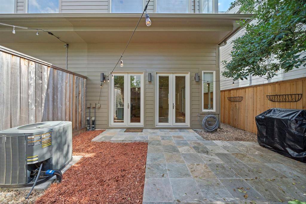 Private Patio Retreat: This cozy backyard space features a neat, low-maintenance patio, perfect for relaxing and entertaining.
