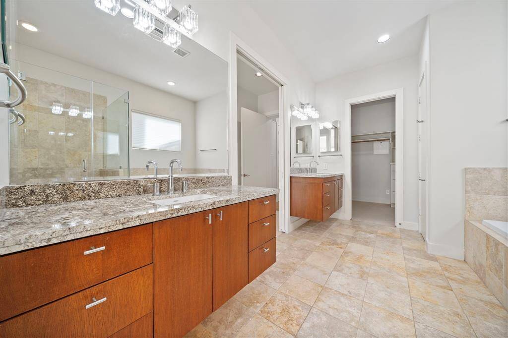 Primary Bath with handsomely appointed dual vanities
