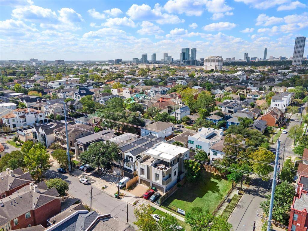 Discover urban living in the vibrant River Oaks Shopping Area, boasting walkable streets lined with upscale shopping and dining options amidst a picturesque residential backdrop.