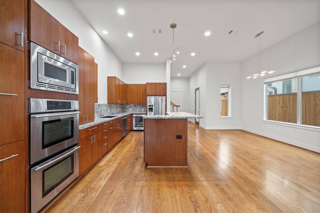 Gourmet Kitchen with elegant custom hardwood cabinetry.