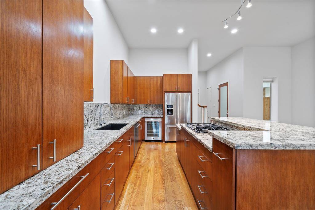 Modern kitchen featuring sleek, updated Jenn-Air appliances.
