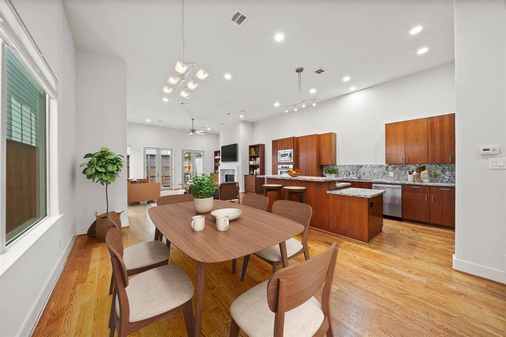 Dining Area and Kitchen [virtually staged]