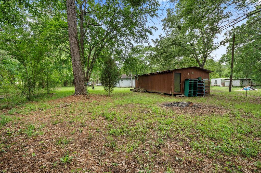 The oversized lot offers fantastic potential for gardening, recreational space, or additional structures. A peaceful setting that inspires outdoor creativity.