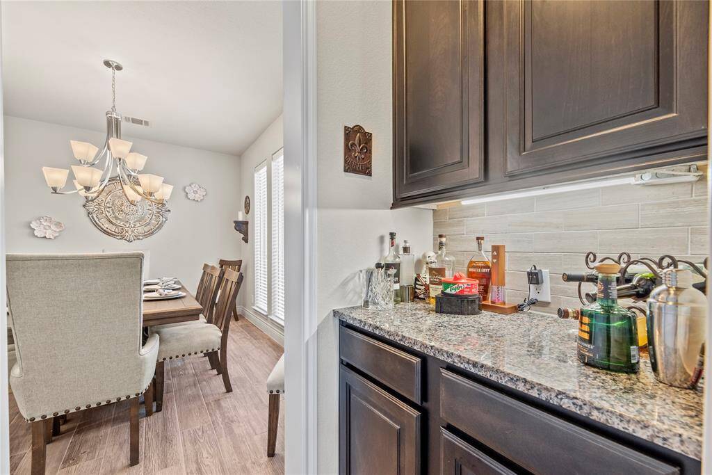 The dining room features a butlers pantry ideal for entertaining.