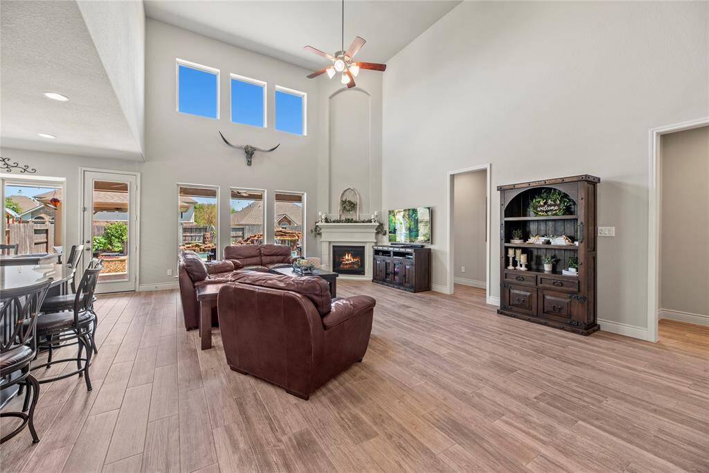 The open layout connects seamlessly to the dining area, offering a perfect space for family gatherings and entertaining.