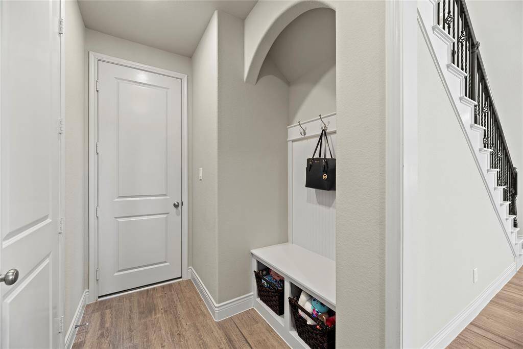 This is the perfect MUD Room space to drop off backpacks, sweater and shoes!