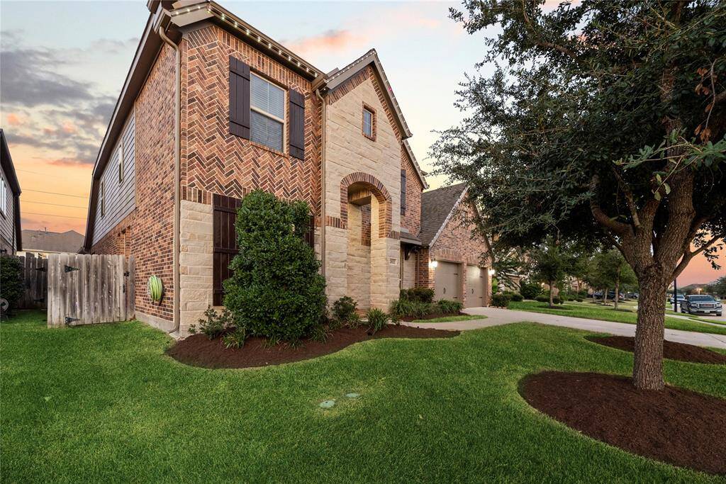 This home is situated on a quiet street, offering a welcoming and serene setting.